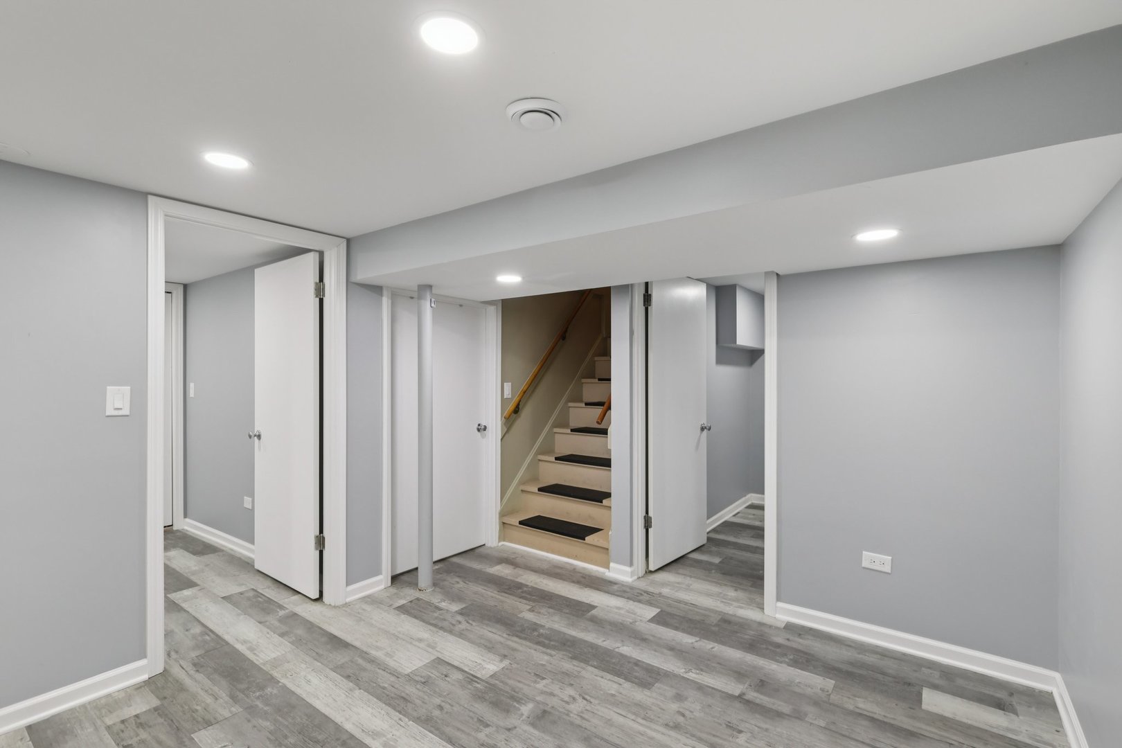 1034 31st Avenue Bellwood, IL 60104 - Photo 15 of 30 a view of a hallway with staircase and white walls