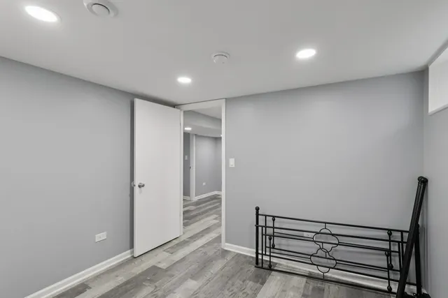 a view of entryway with wooden floor