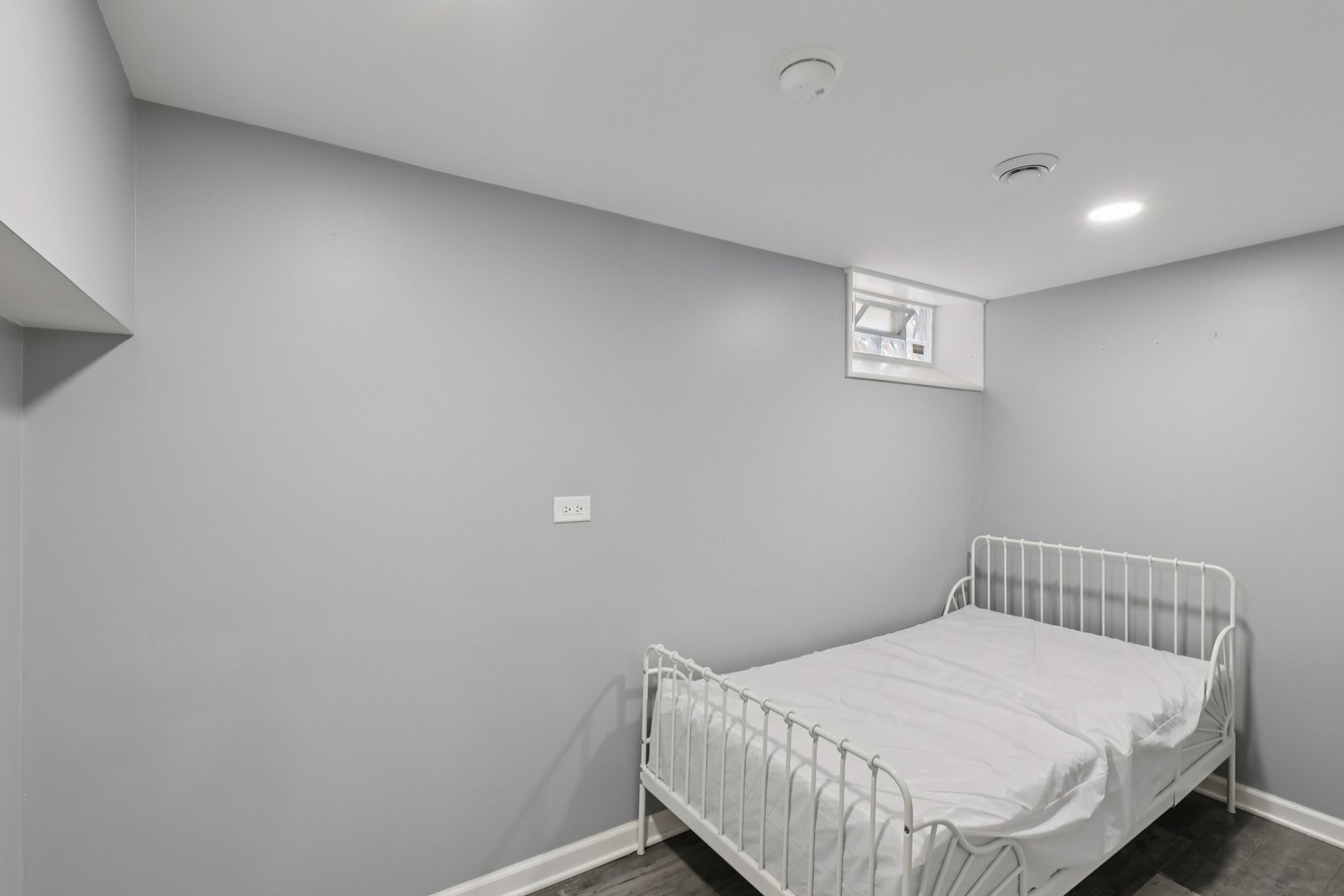 1034 31st Avenue Bellwood, IL 60104 - Photo 18 of 30 a bedroom with a bed and a window