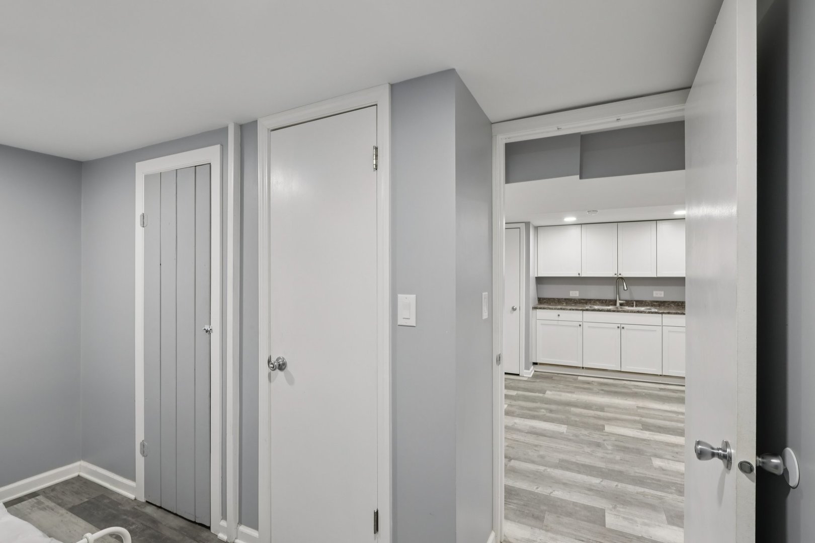1034 31st Avenue Bellwood, IL 60104 - Photo 19 of 30 a kitchen with white cabinets and sink