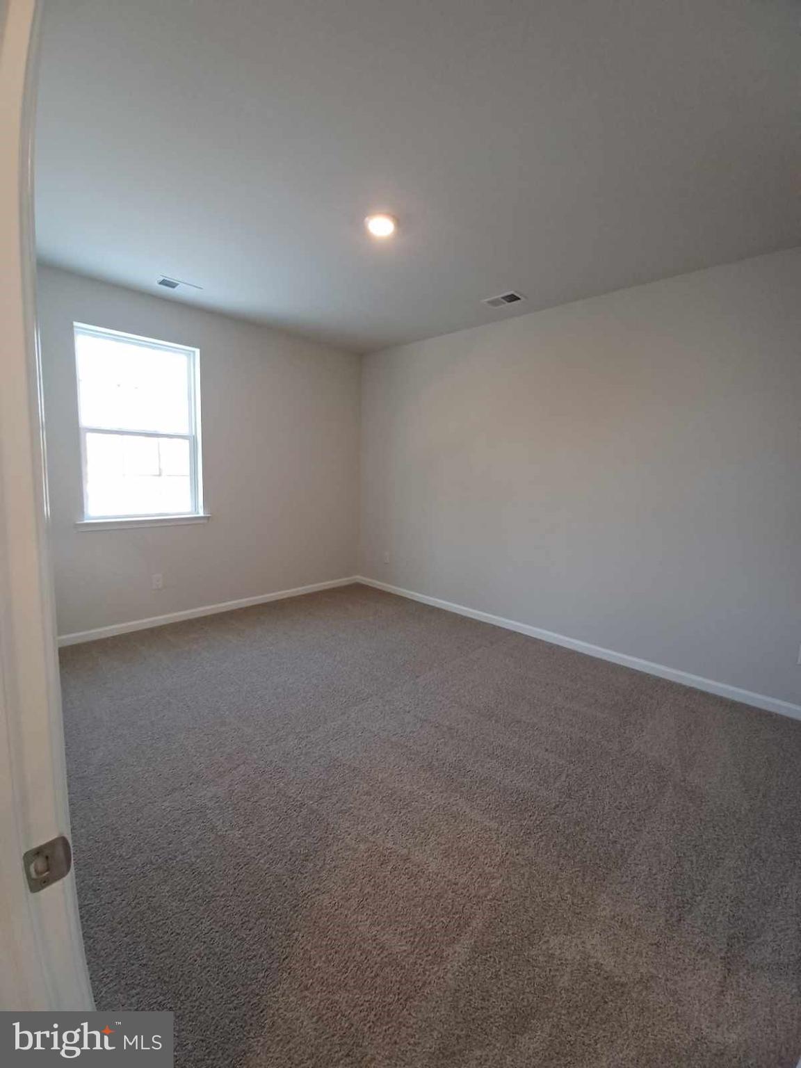 112 Winding Road Easton, PA 18040 - Photo 32 of 33 an empty room with a window