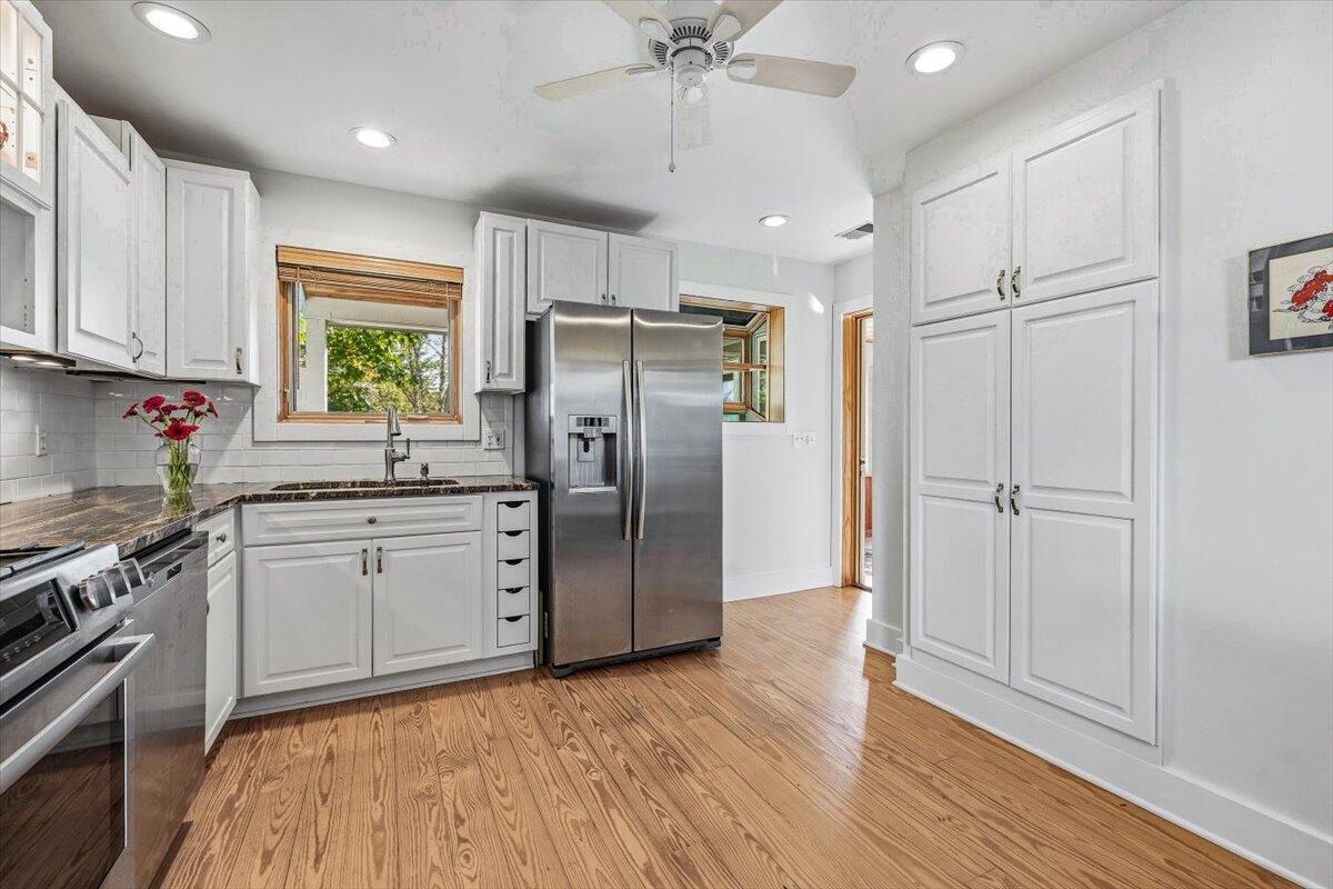 24 Tryon Farm Lane Michigan City, IN 46360 - Photo 18 of 44 a kitchen with stainless steel appliances a refrigerator sink and microwave