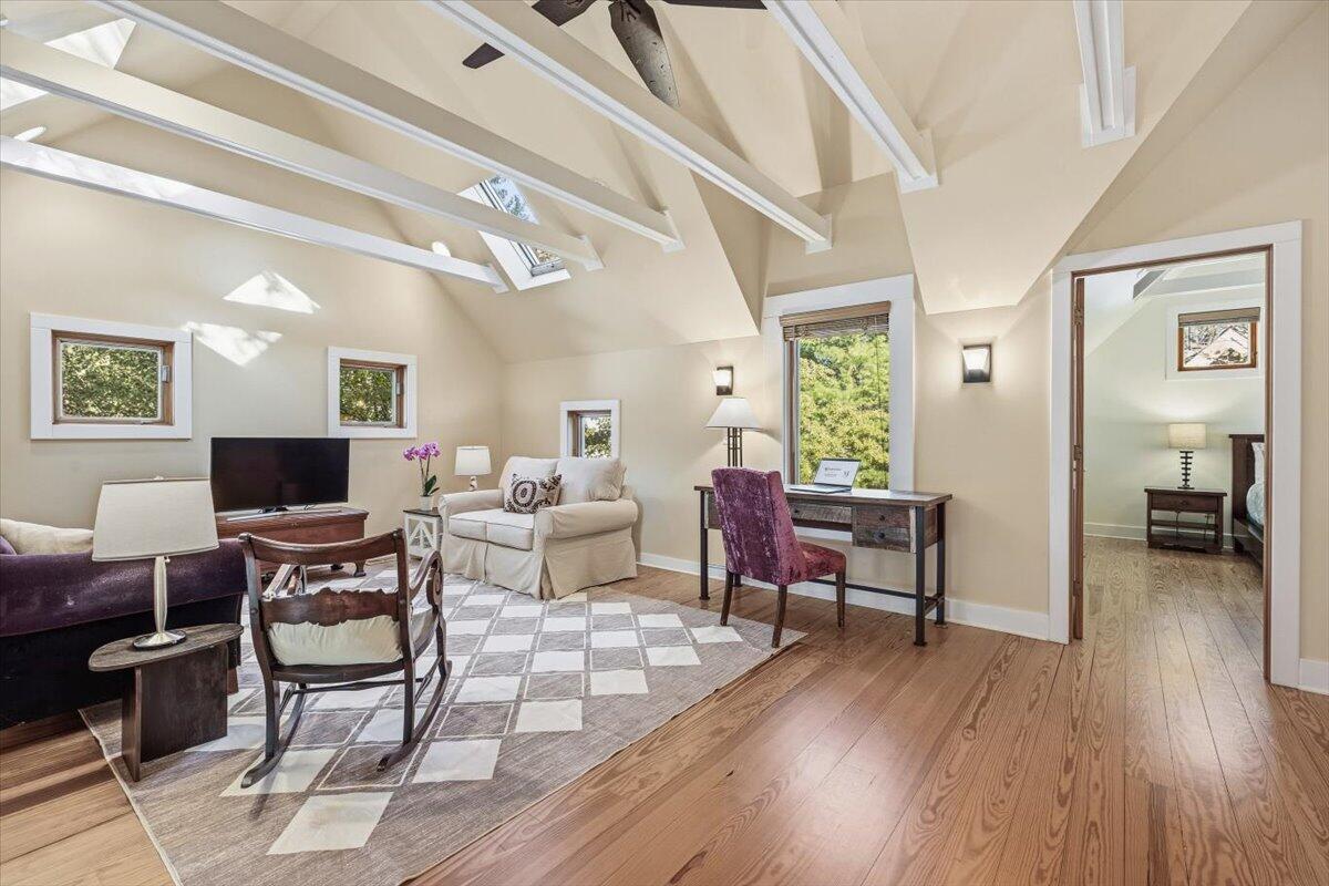 24 Tryon Farm Lane Michigan City, IN 46360 - Photo 23 of 44 a living room with furniture dining table wooden floor and a large window