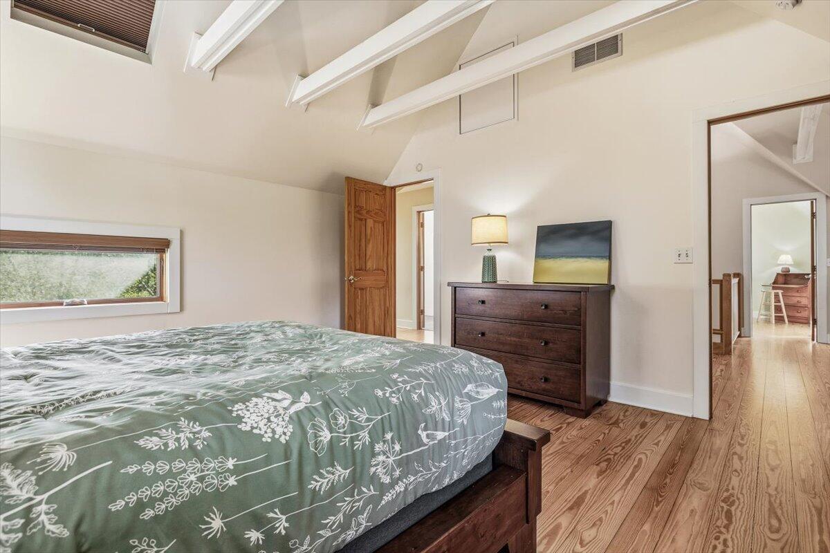 24 Tryon Farm Lane Michigan City, IN 46360 - Photo 26 of 44 a bedroom with a bed and wooden floor