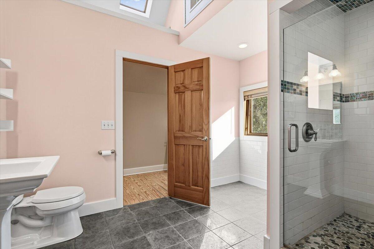 24 Tryon Farm Lane Michigan City, IN 46360 - Photo 28 of 44 a bathroom with a shower and a toilet