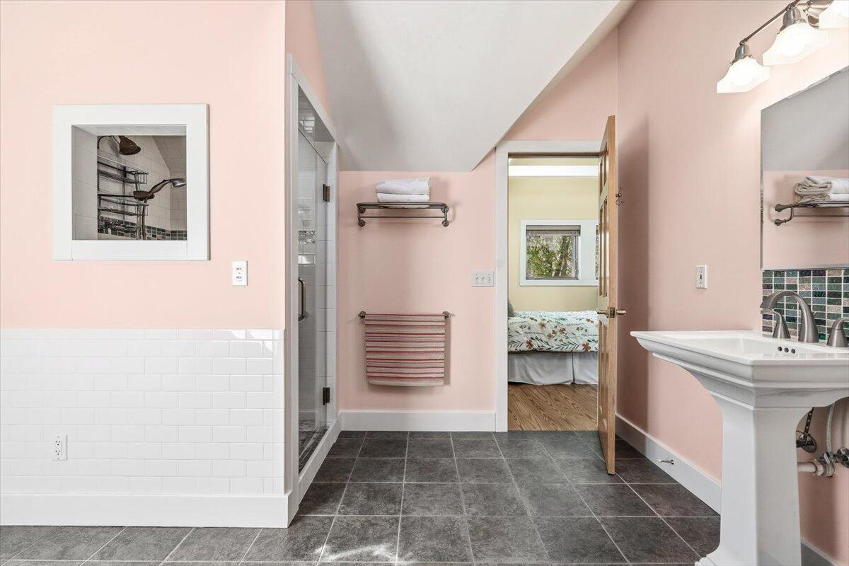 24 Tryon Farm Lane Michigan City, IN 46360 - Photo 29 of 44 a bathroom with a sink a toilet and shower