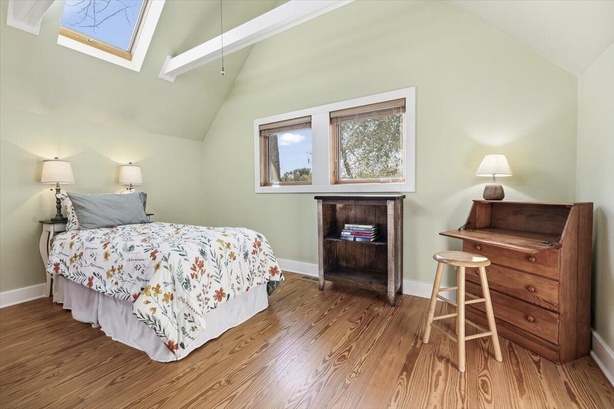 24 Tryon Farm Lane Michigan City, IN 46360 - Photo 30 of 44 a bedroom with a bed and a fireplace