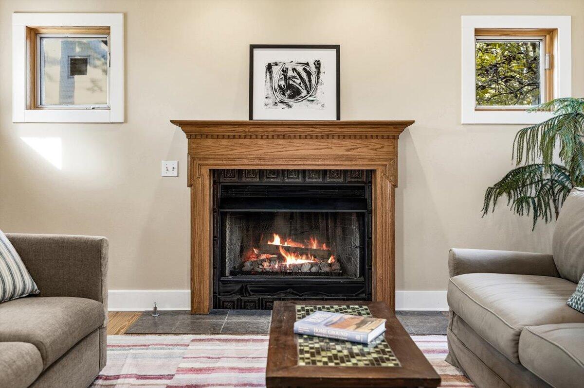 24 Tryon Farm Lane Michigan City, IN 46360 - Photo 7 of 44 a living room with furniture a fireplace and a potted plant