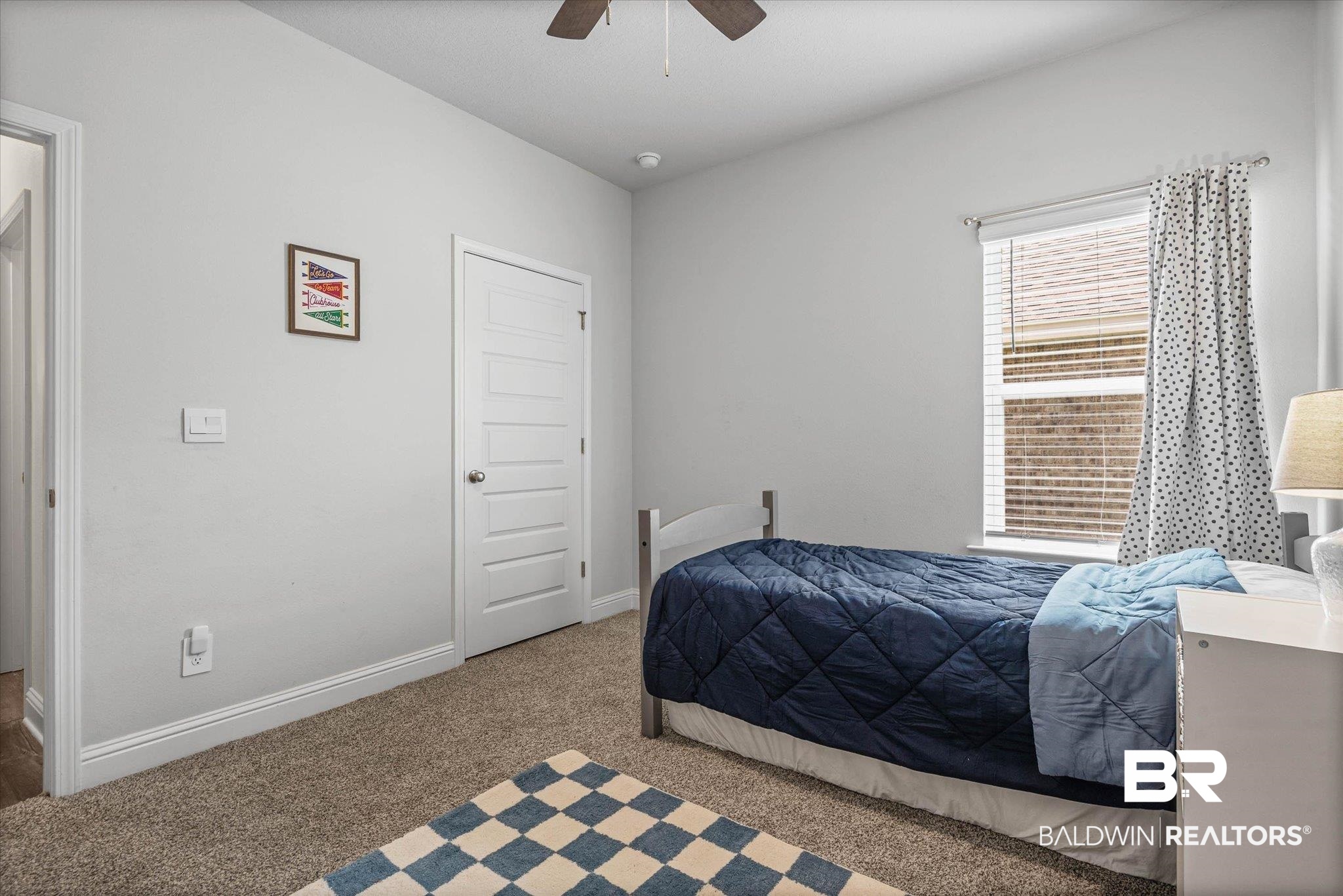 10541 Heirloom Road South Mobile, AL 36608 - Photo 16 of 23 Carpeted room featuring a ceiling fan, white baseboards, and a window with blinds