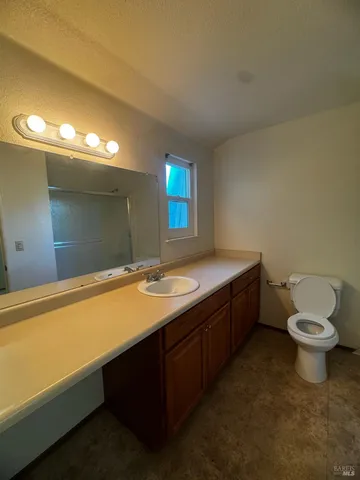 a bathroom with a sink and a toilet