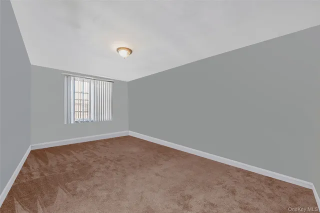 a view of a kitchen with electric appliances