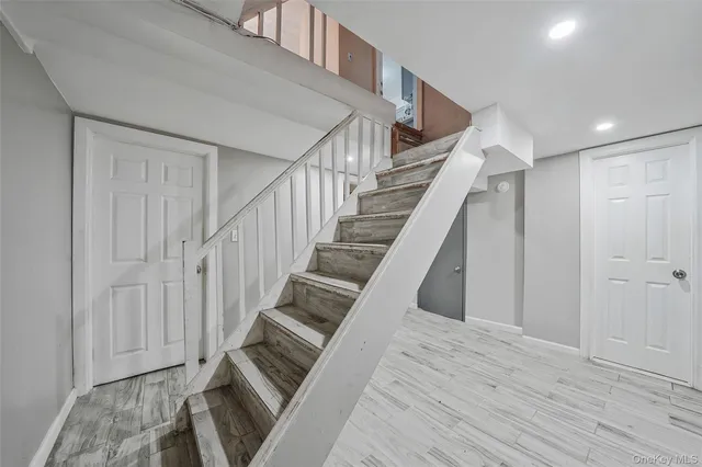 a room with furniture and wooden floor