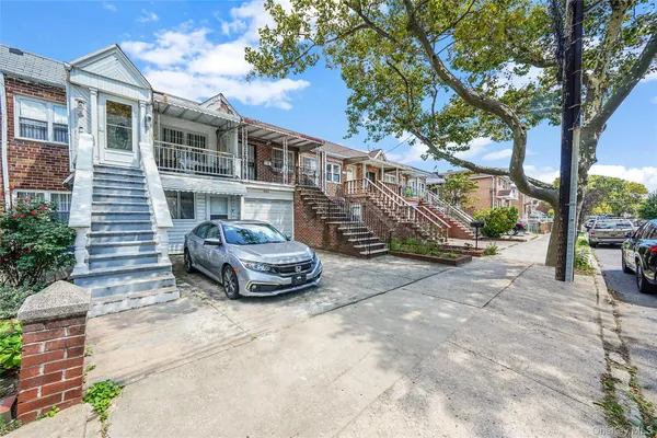 a car parked in front of a house