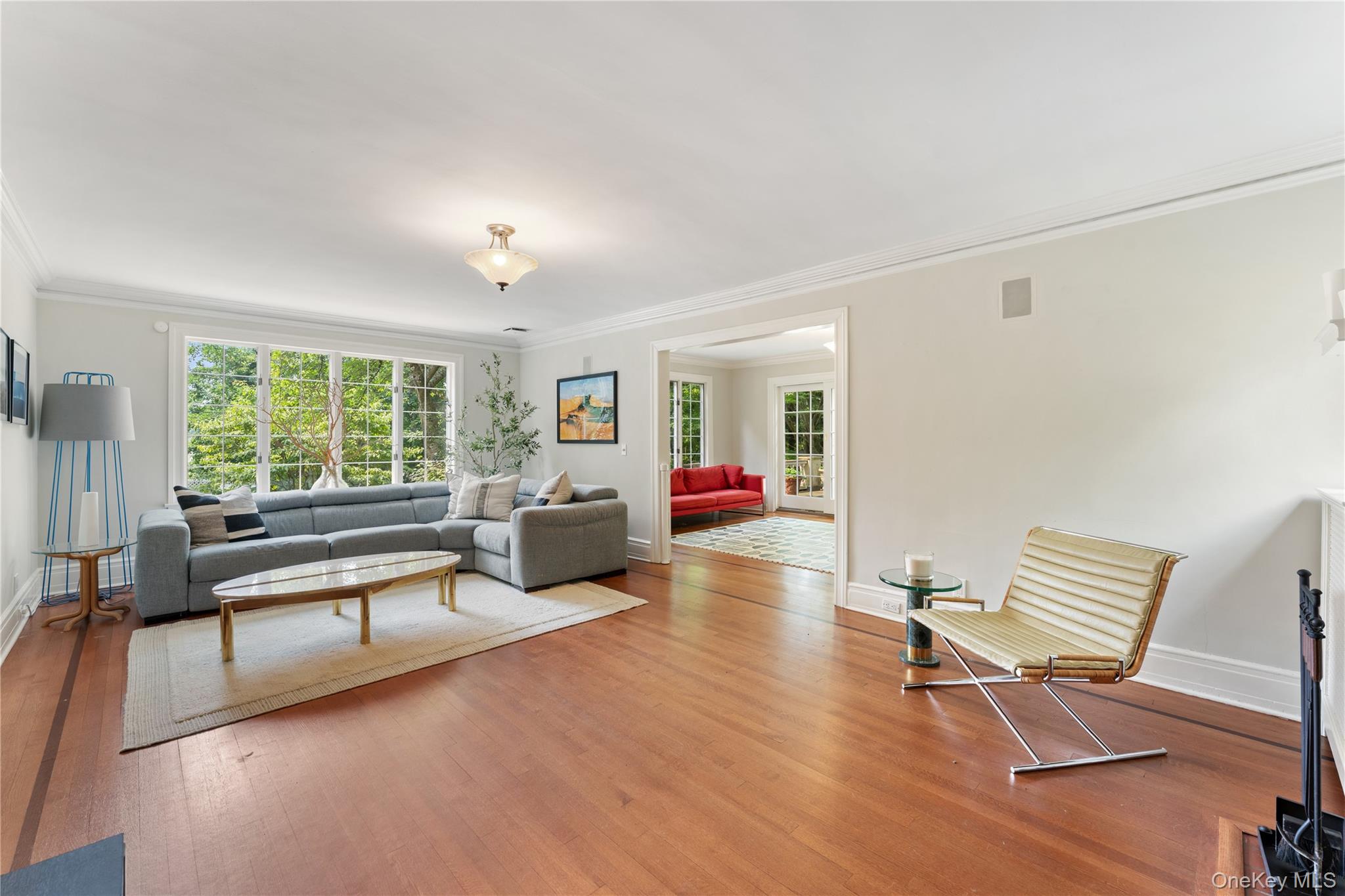 2 Dellwood Road Bronxville, NY 10708 - Photo 5 of 36 Formal Living Room looking into the sunroom.
