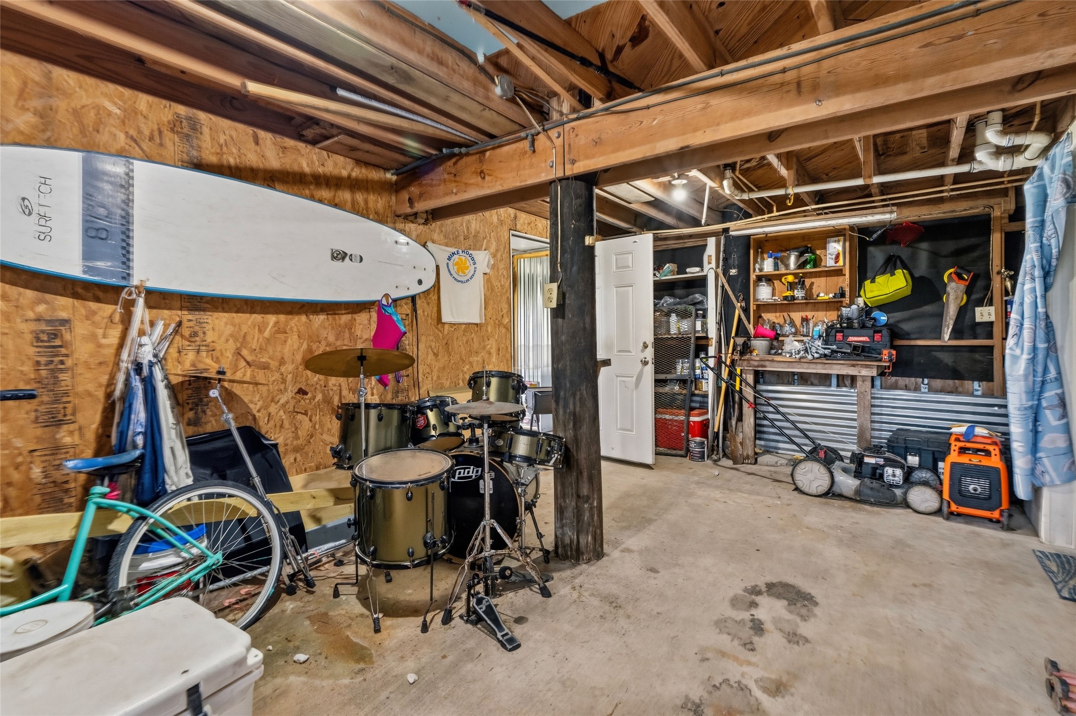 512 Caisson Street Surfside Beach, TX 77541 - Photo 22 of 29 a view of a room with gym equipment
