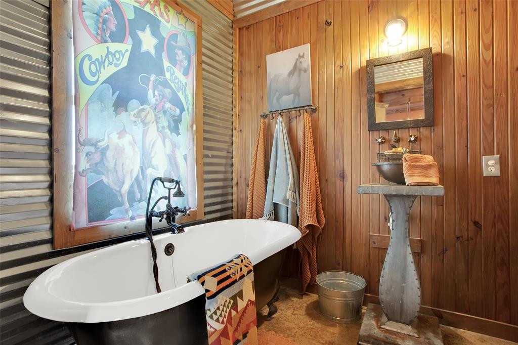 855 Buck Creek Road Tioga, TX 76271 - Photo 16 of 27 a bathroom with a sink toilet and shower