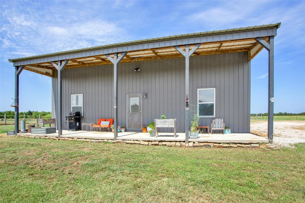855 Buck Creek Road Tioga, TX 76271 - Photo 2 of 27 a view of swimming pool with outdoor seating