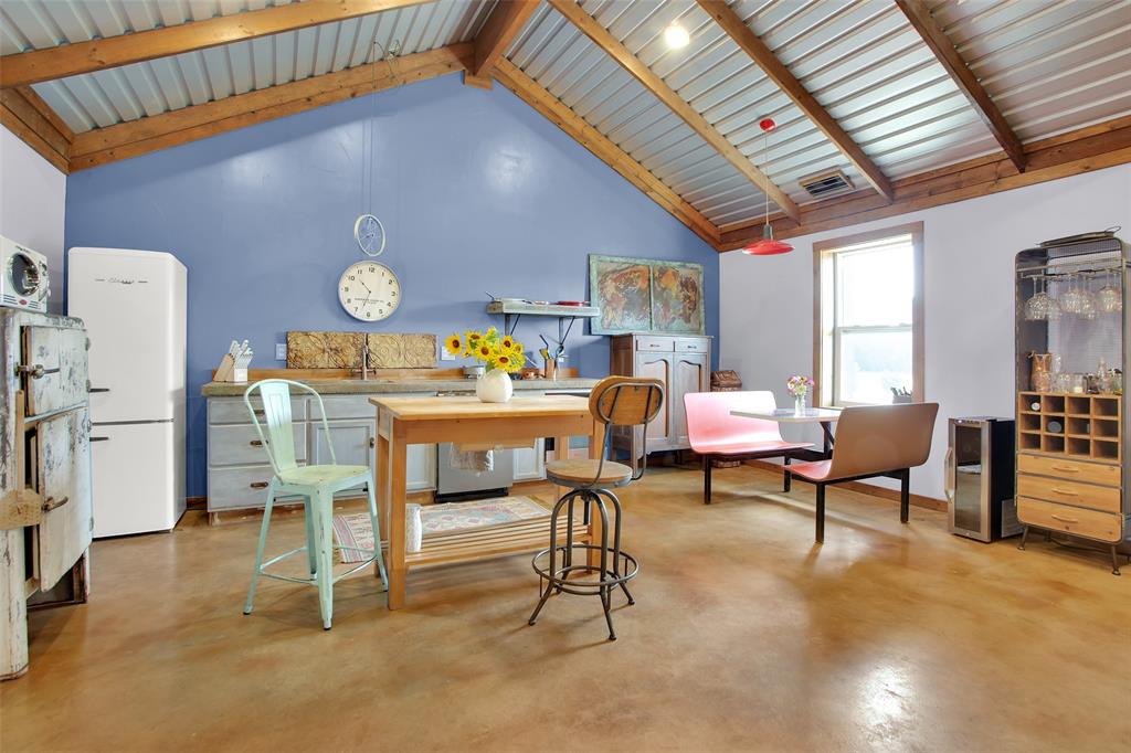 855 Buck Creek Road Tioga, TX 76271 - Photo 6 of 27 a living room with furniture and a wooden floor