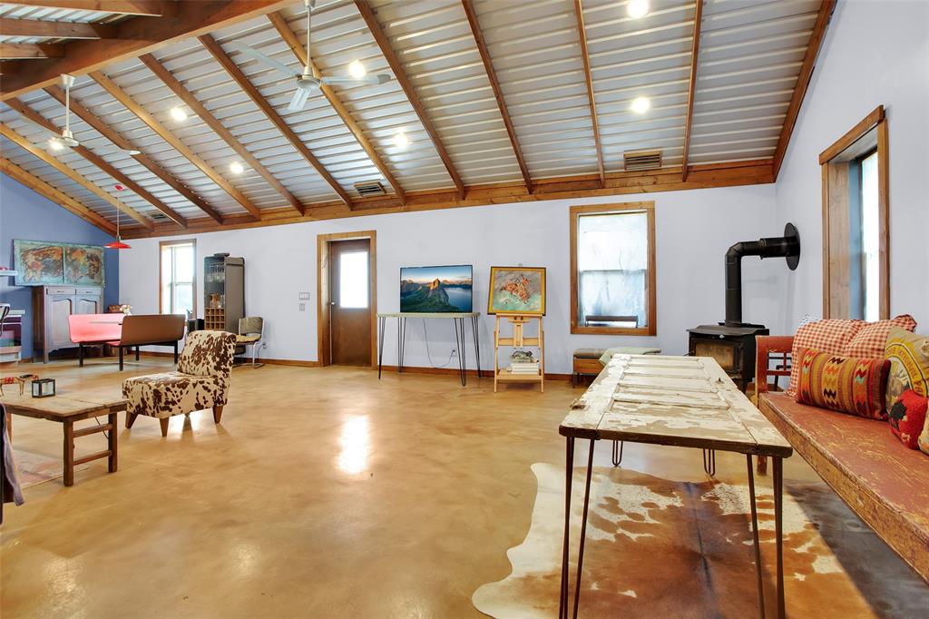 855 Buck Creek Road Tioga, TX 76271 - Photo 9 of 27 a outdoor space with lots of furniture and chandelier