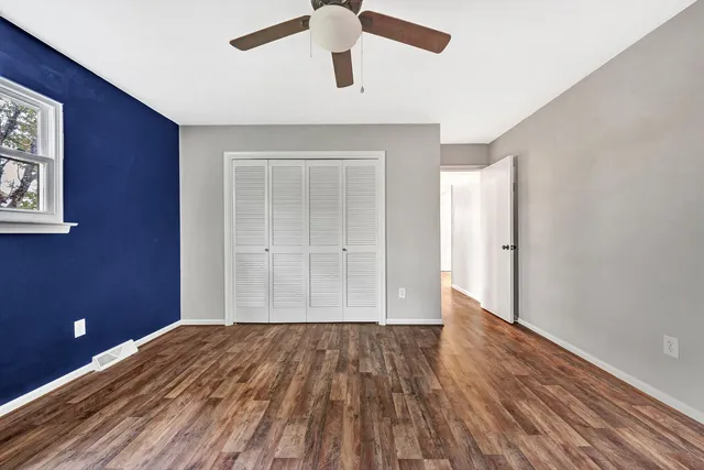 a view of a livingroom with wooden floor