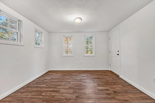 an empty room with windows