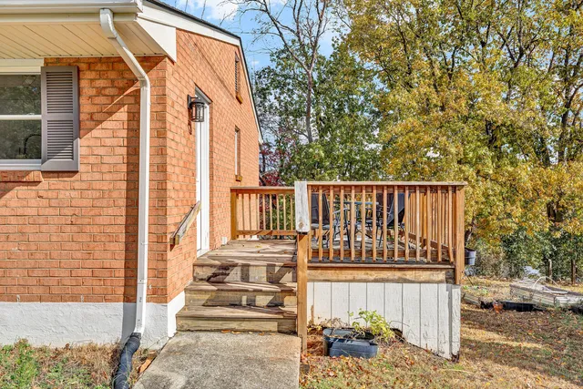 a view of a balcony with furniture