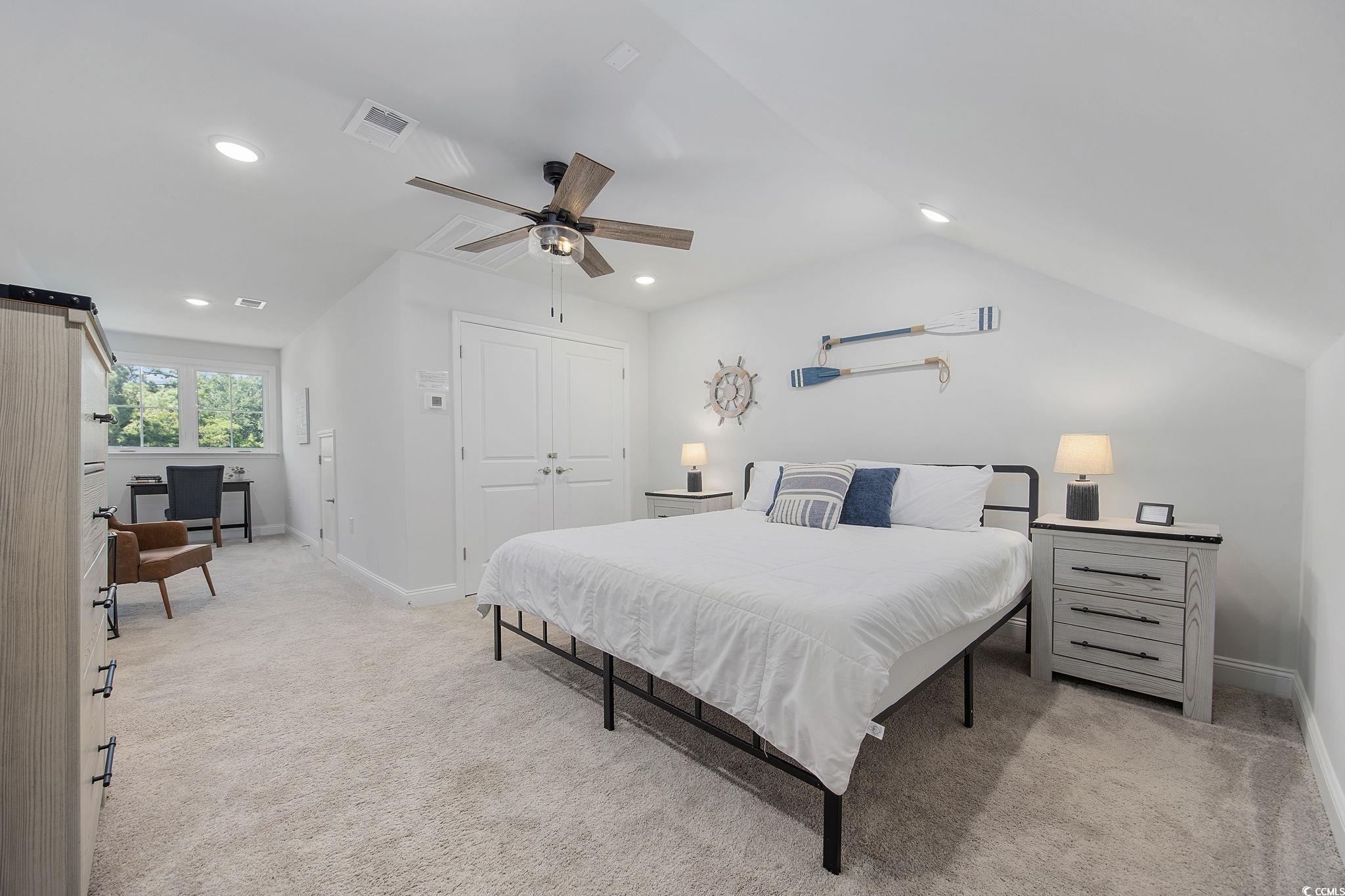 5130 Double Eagle Way North Myrtle Beach, SC 29582 - Photo 25 of 39 Bedroom featuring light colored carpet, a closet, ceiling fan, recessed lighting, and lofted ceiling