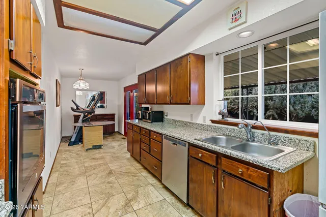 a bedroom with bed and window