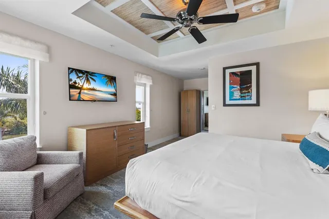 a bedroom with a bed and furniture