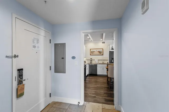 a en suite bathroom with a shower and mirror