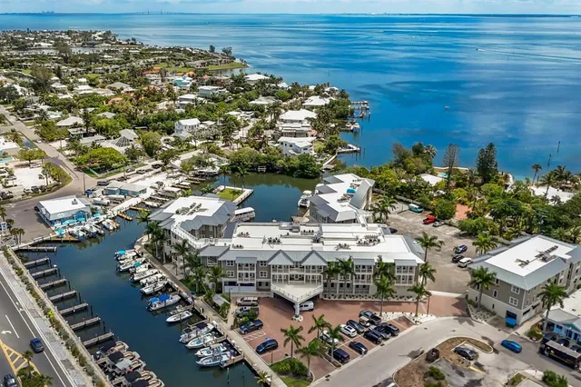 a aerial view of a house with a lake view