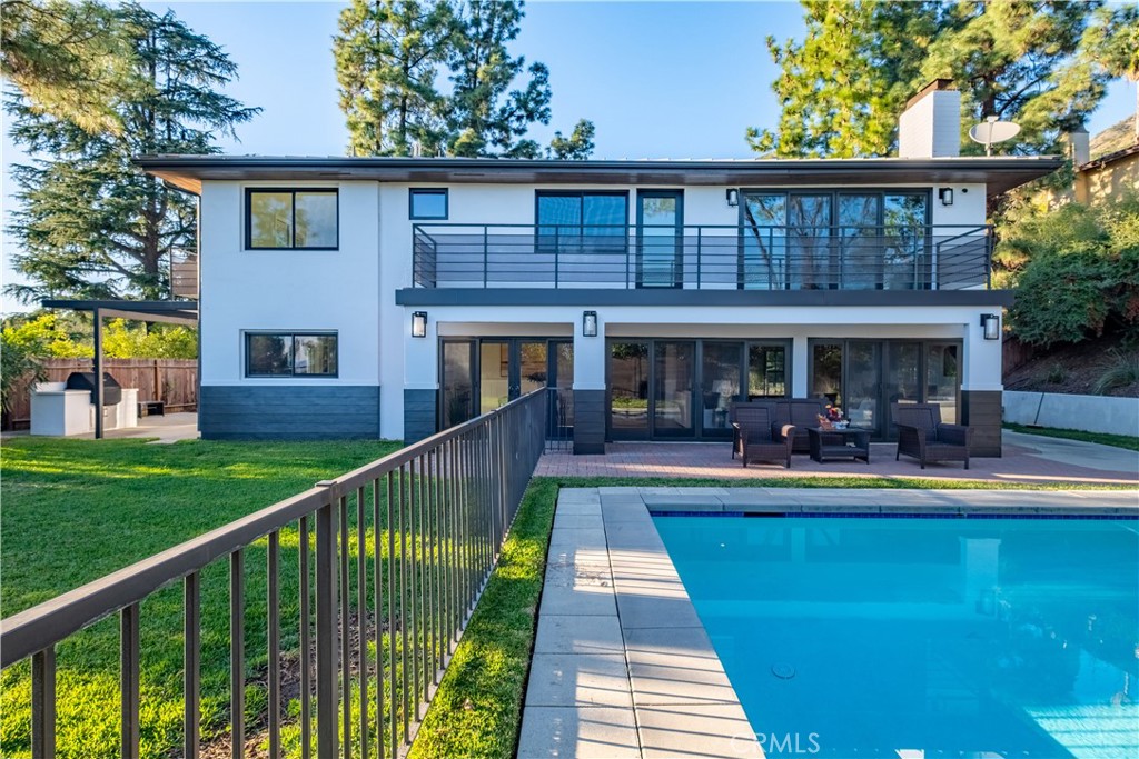 556 Camillo Road Sierra Madre, CA 91024 - Photo 11 of 52 a view of house with swimming pool and sitting area