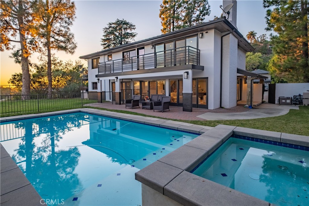 556 Camillo Road Sierra Madre, CA 91024 - Photo 13 of 52 a front view of a house with garden