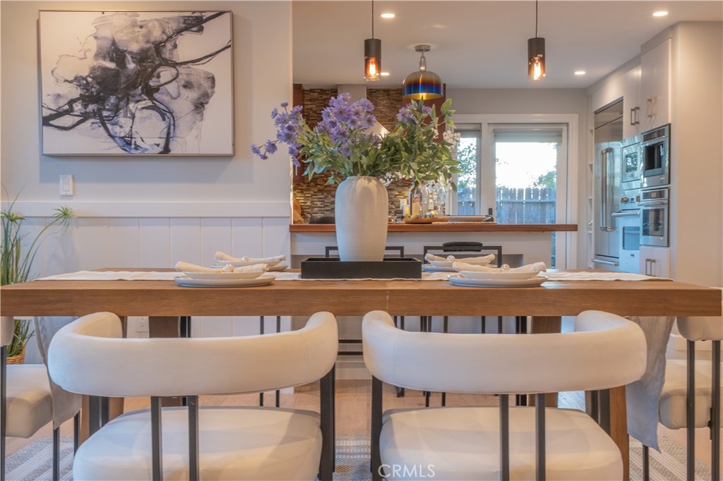 556 Camillo Road Sierra Madre, CA 91024 - Photo 26 of 52 a view of a dining room with furniture window and wooden floor