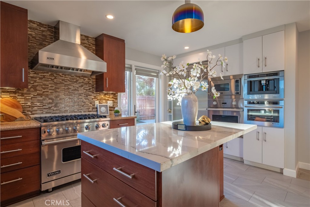 556 Camillo Road Sierra Madre, CA 91024 - Photo 28 of 52 a kitchen with stainless steel appliances granite countertop a sink and a stove