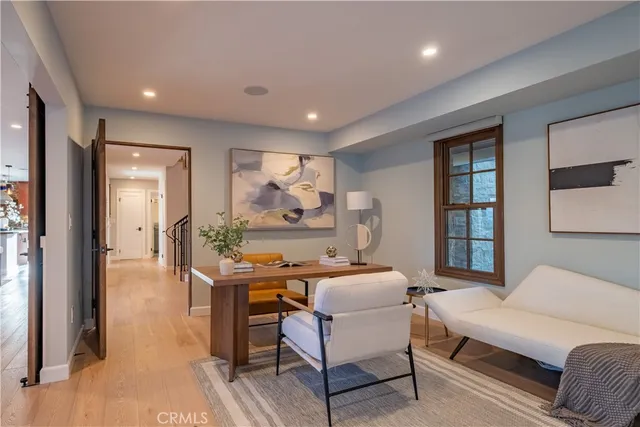 a view of a hallway with windows