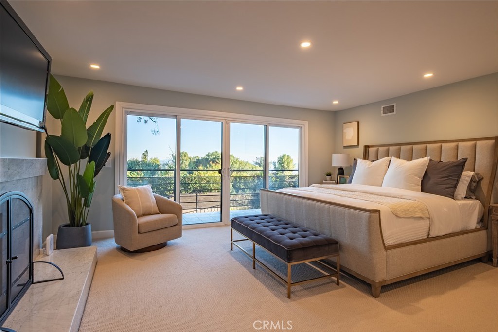 556 Camillo Road Sierra Madre, CA 91024 - Photo 41 of 52 a bed room with a bed and a couch