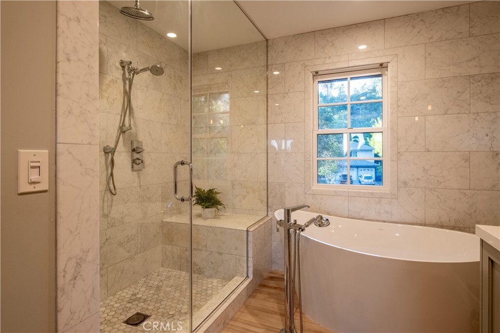 556 Camillo Road Sierra Madre, CA 91024 - Photo 43 of 52 a bathroom with a bathtub and shower
