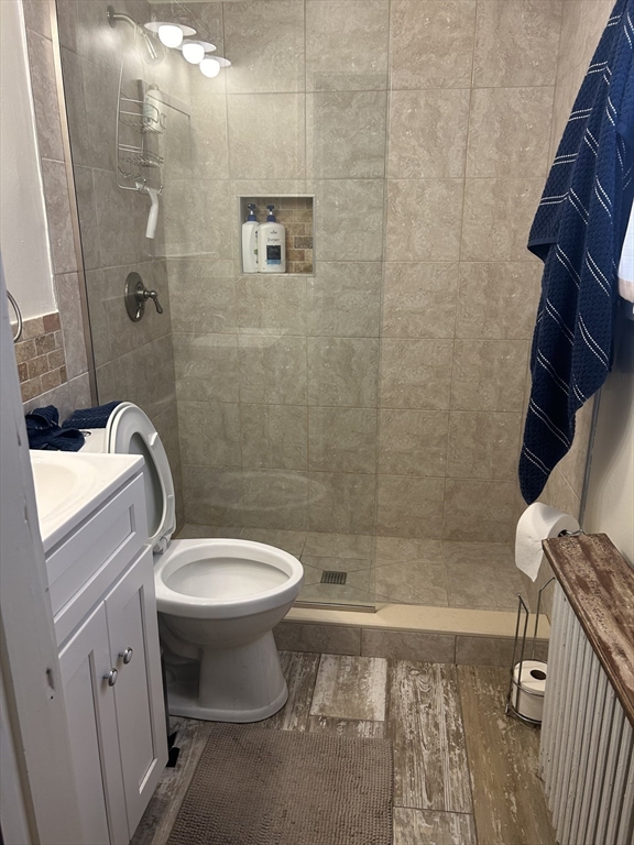 20 William Street Fairhaven, MA 02719 - Photo 5 of 7 a bathroom with a sink toilet and shower