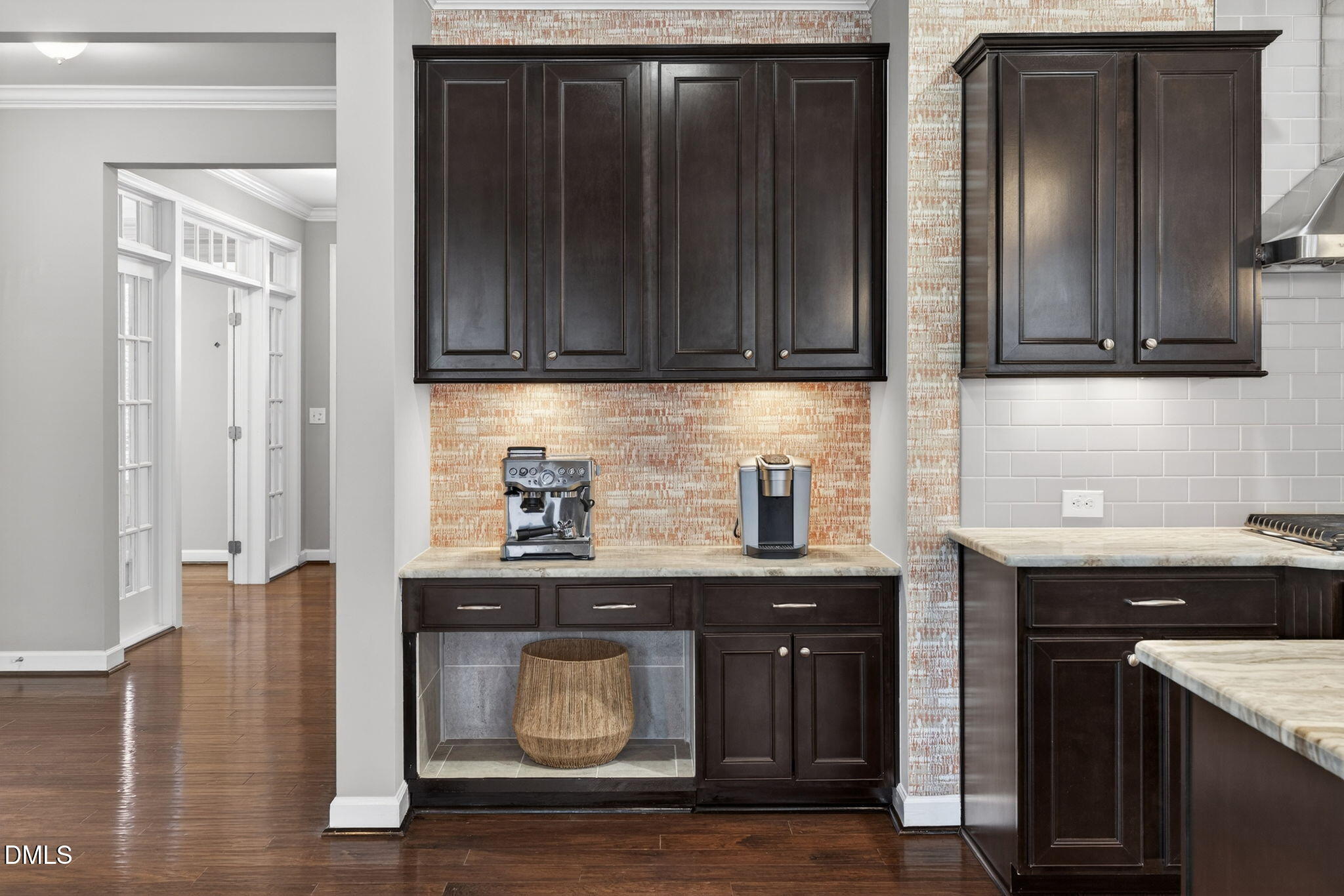 8001 Hergety Drive Raleigh, NC 27603 - Photo 11 of 52 a kitchen with granite countertop wooden cabinets and granite counter tops