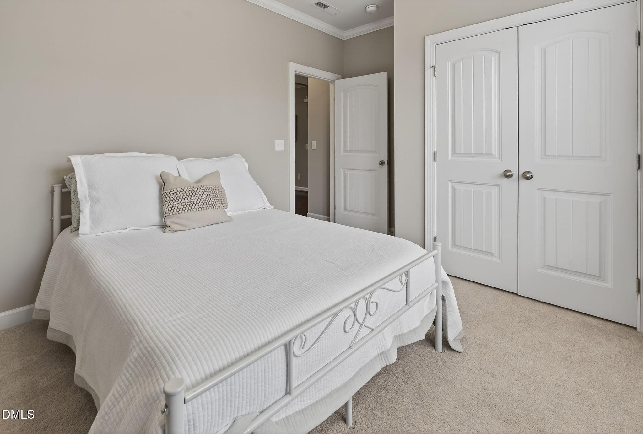 8001 Hergety Drive Raleigh, NC 27603 - Photo 23 of 52 a large white bed in a white room
