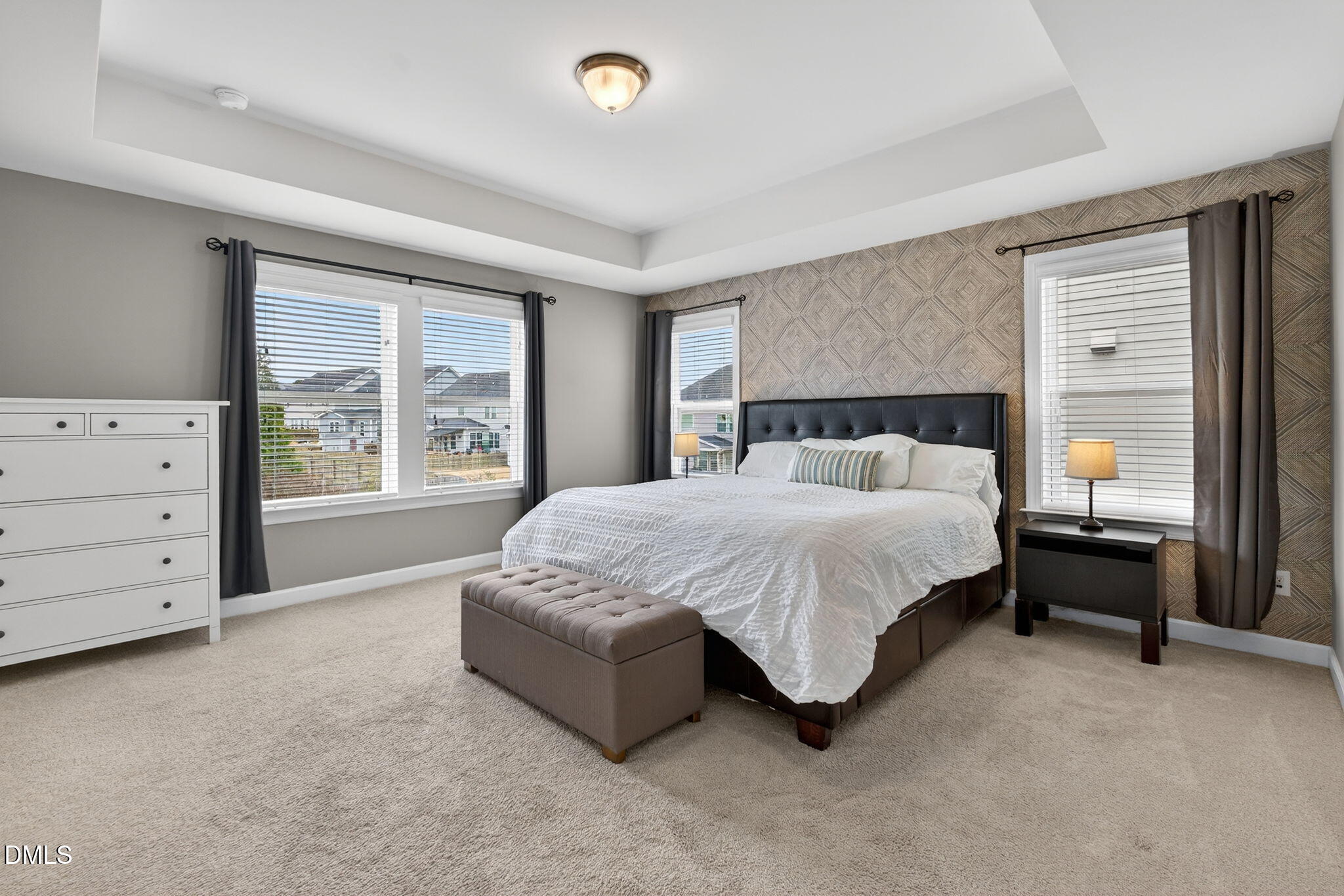 8001 Hergety Drive Raleigh, NC 27603 - Photo 25 of 52 a spacious bedroom with a bed and a dresser