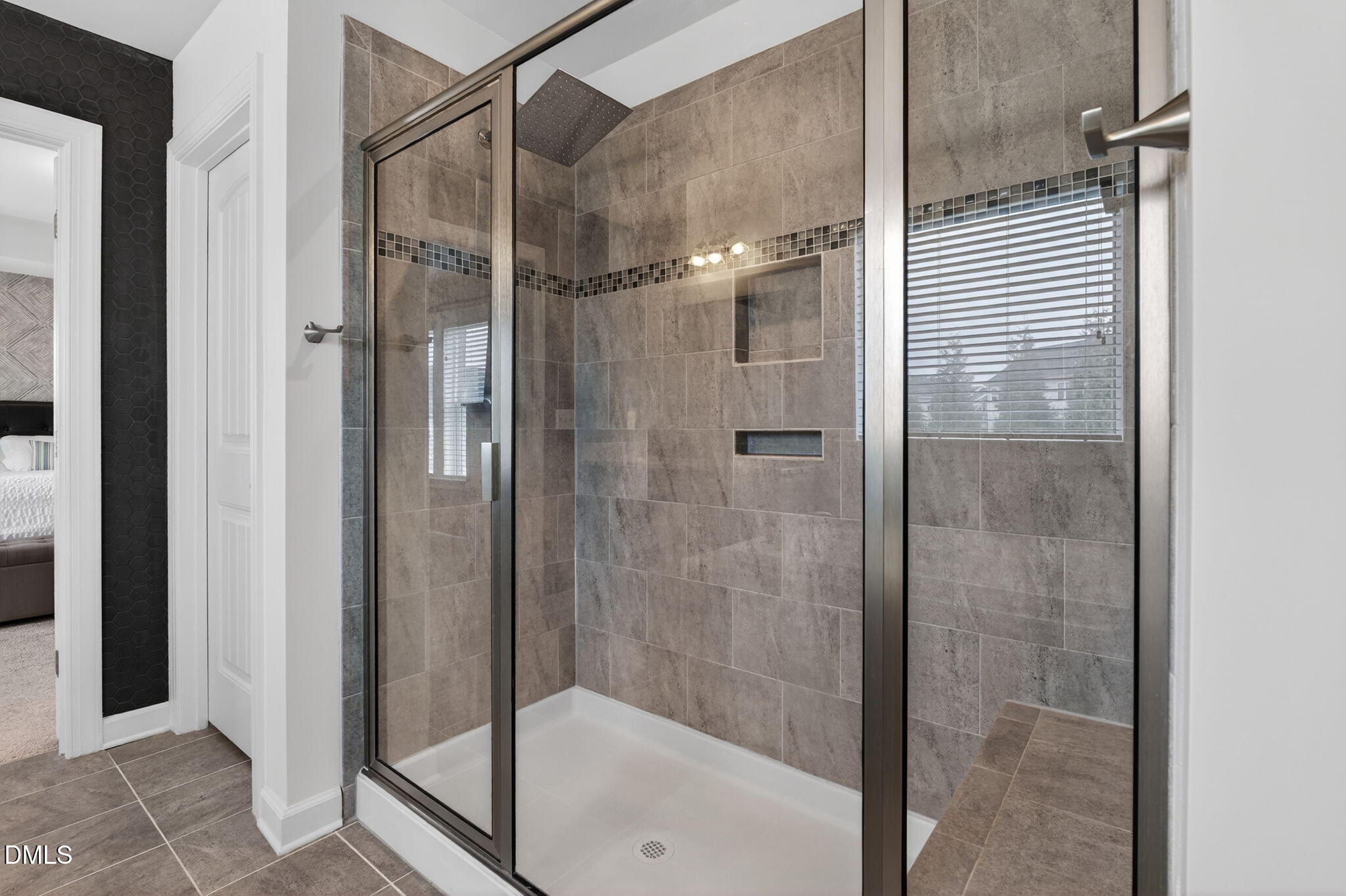 8001 Hergety Drive Raleigh, NC 27603 - Photo 29 of 52 a bathroom with a glass shower door