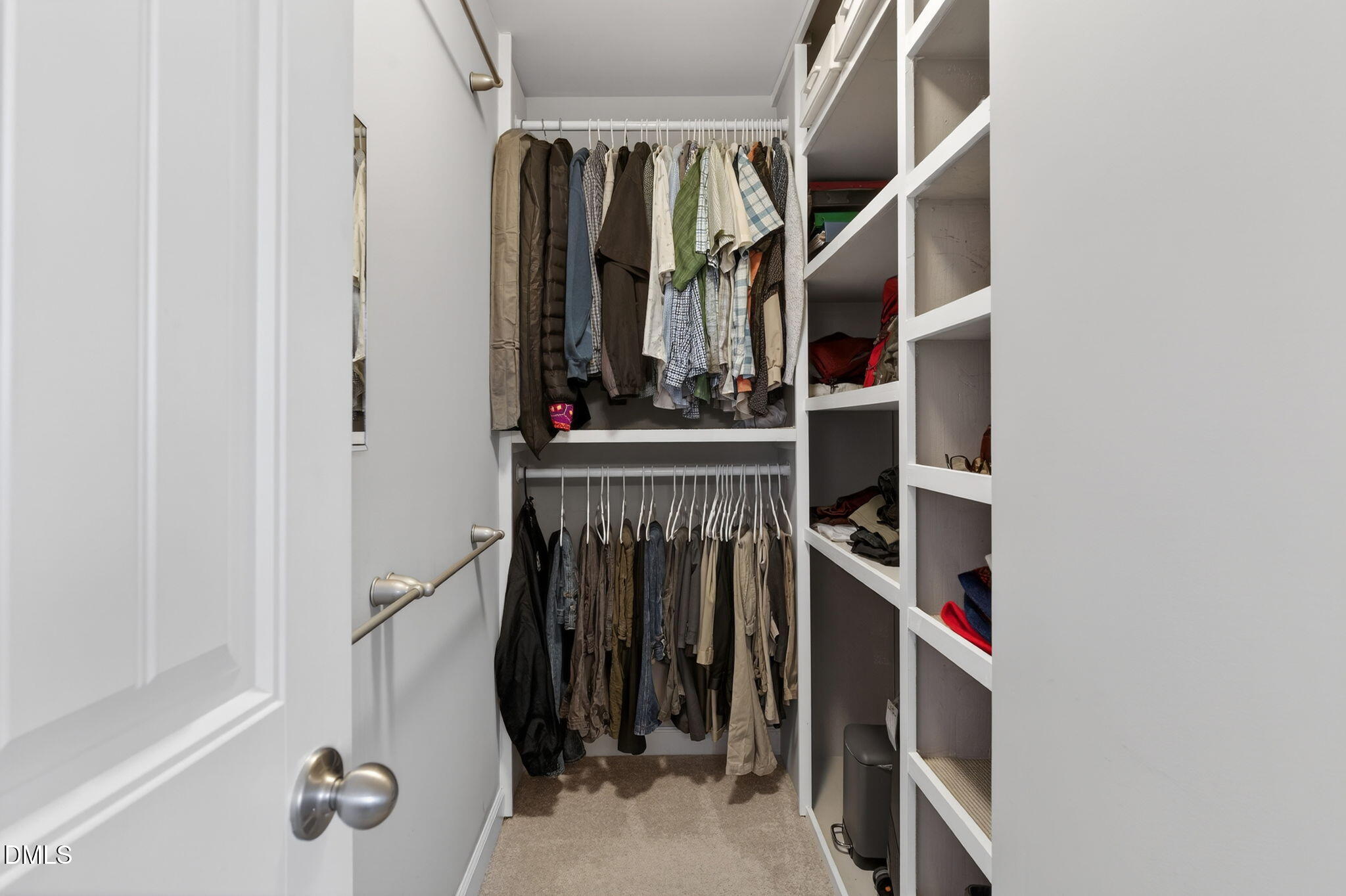 8001 Hergety Drive Raleigh, NC 27603 - Photo 31 of 52 a view of walk in closet with clothes and shoes