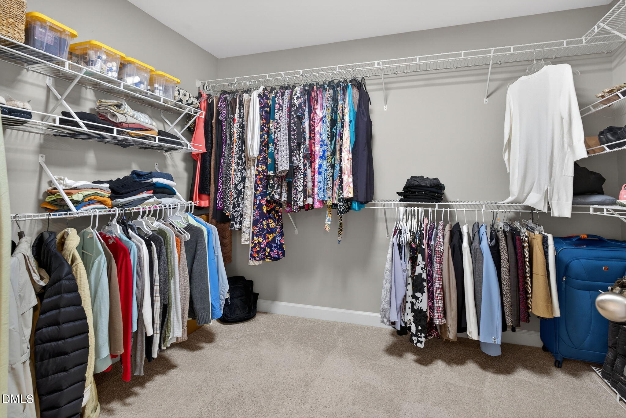 8001 Hergety Drive Raleigh, NC 27603 - Photo 32 of 52 a view of walk in closet with clothes