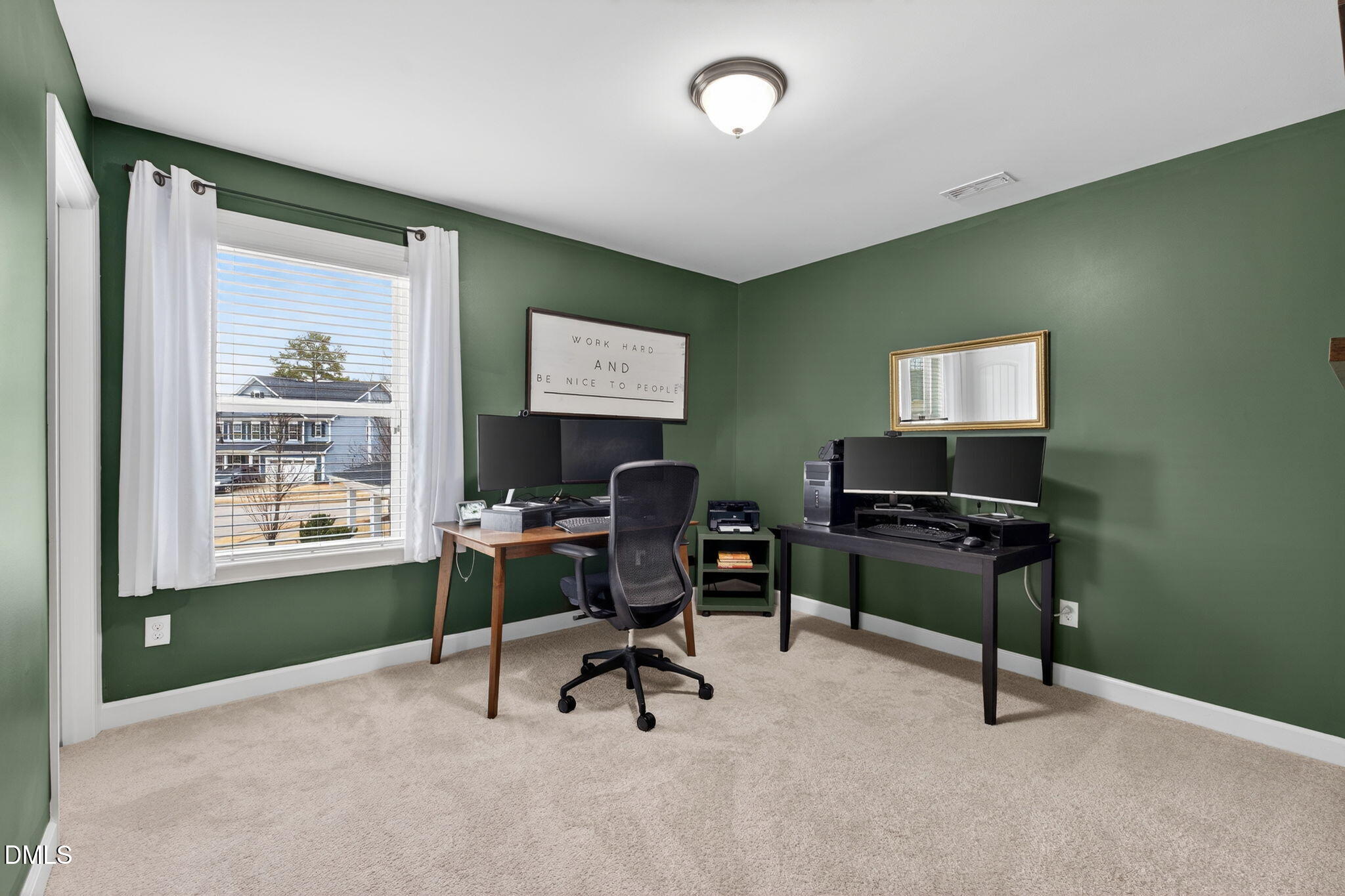 8001 Hergety Drive Raleigh, NC 27603 - Photo 36 of 52 a view of a workspace with furniture and a window