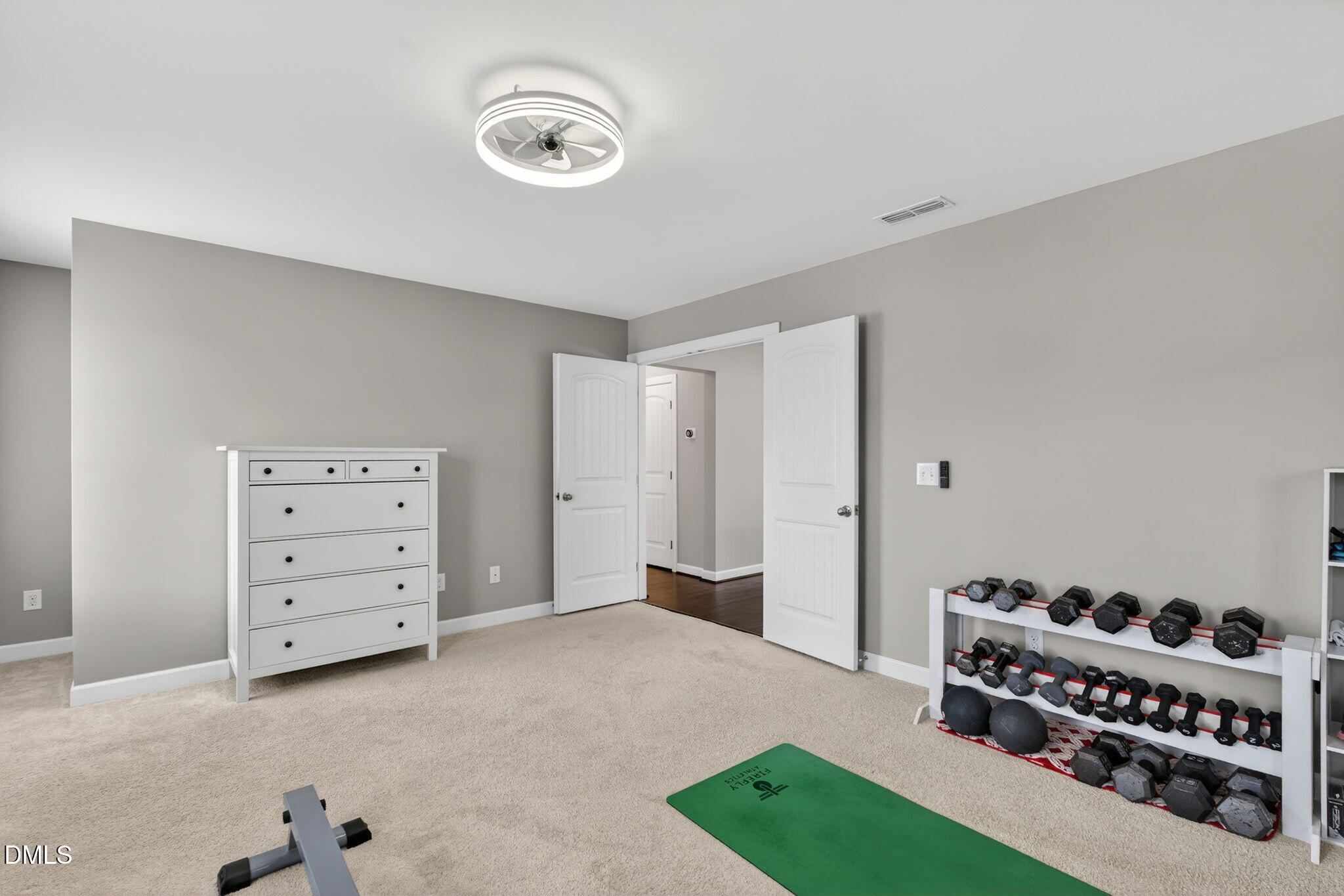 8001 Hergety Drive Raleigh, NC 27603 - Photo 39 of 52 a view of a bedroom with cabinet and air conditioner duct