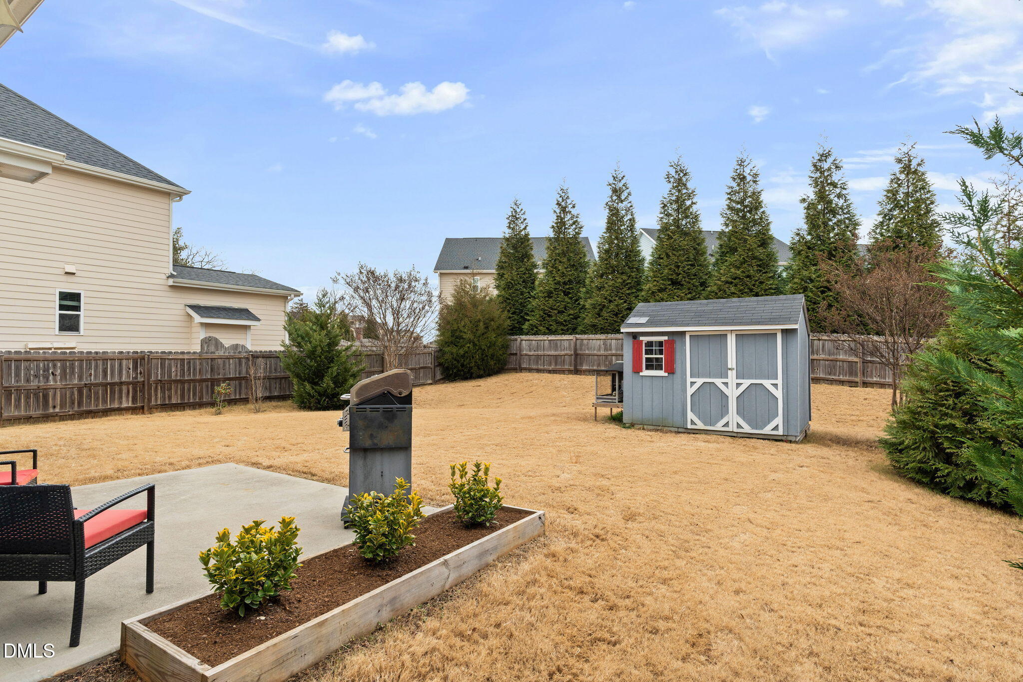 8001 Hergety Drive Raleigh, NC 27603 - Photo 44 of 52 a front view of a house with a yard