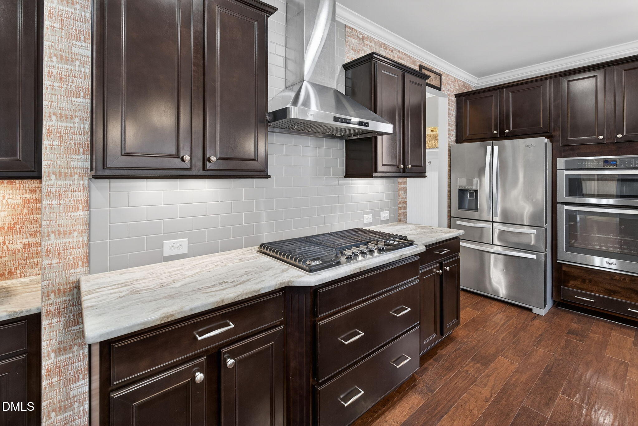8001 Hergety Drive Raleigh, NC 27603 - Photo 9 of 52 a kitchen with stainless steel appliances granite countertop a stove a refrigerator and a sink