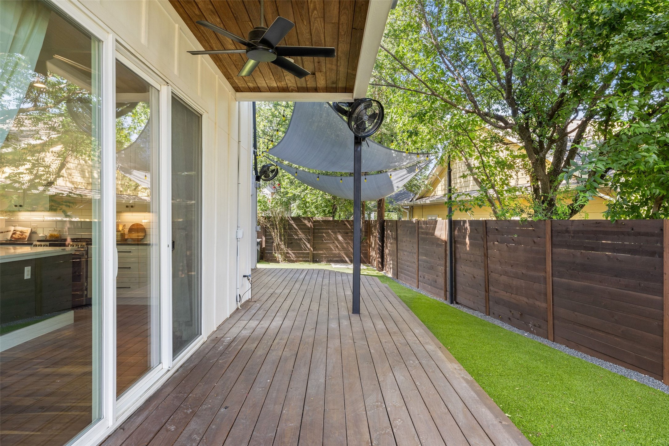5601 Jackie Robinson Street, Unit 1 Austin, TX 78721 - Photo 32 of 40 Whether hosting friends for sunset cocktails or enjoying a quiet morning coffee, the flow between the chef’s kitchen and outdoor sanctuary is exceptional.